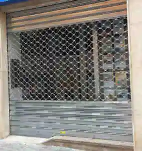 puerta enrollable metalica 283x300 - reparacion persianas metalicas para local barcelona valencia